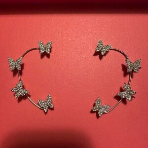 2 Silver butterfly rhinestone ear cuffs. No piercing needed.
